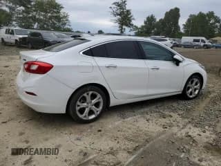 ✅ 2017 Chevrolet Cruze Premier • VIN: 1G1BF5SM0H7190284 • Lot: 64215143. Listed on Copart with 102,780 mi. Free auction sales archive from the USA and detailed vehicle history report at DreamBid. Image 3.