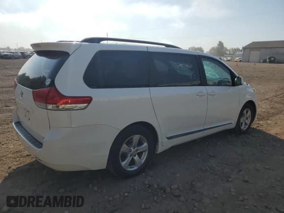 ✅ 2014 Toyota Sienna LE AAS • VIN: 5TDKK3DC4ES517797 • Lot: 80517025. Listed on Copart with 128,188 mi. Free auction sales archive from the USA and detailed vehicle history report at DreamBid. Image 3.