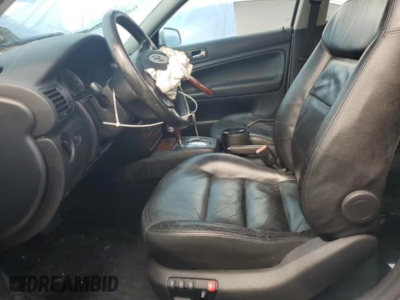 ✅ 2003 Volkswagen Passat GLX • VIN: WVWWH63B13E317182 • Lot: 62101655. Listed on Copart with 175,943 mi. Free auction sales archive from the USA and detailed vehicle history report at DreamBid. Image 7.