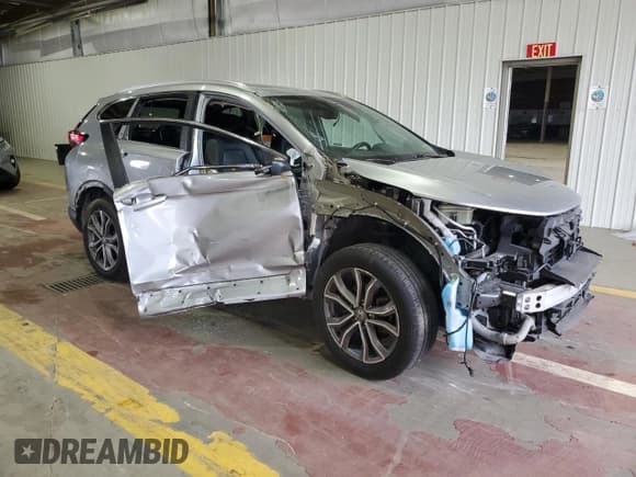 ✅ 2020 Honda CR-V Touring • VIN: 2HKRW2H92LH625141 • Lot: 64184515. Listed on Copart with 49,671 mi. Free auction sales archive from the USA and detailed vehicle history report at DreamBid. Image 4.