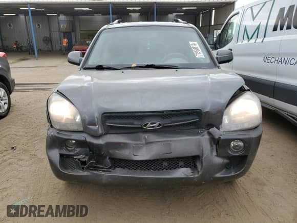 2007 Hyundai Tucson SE with VIN KM8JN72D57U518473, listed as a Copart auction lot 71998814 with 106,340 mi miles and Salvage title. Bid and sale history available at DreamBid. Image 5.