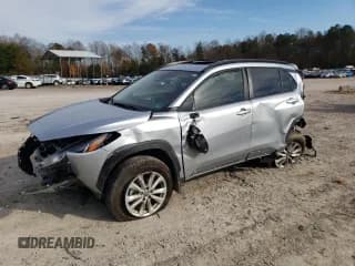 ✅ 2025 Toyota Corolla Cross LE • VIN: 7MUBAABG7SV128084 • Lot: 91420175. Listed on Copart with 22,479 mi. Free auction sales archive from the USA and detailed vehicle history report at DreamBid. Image 1.