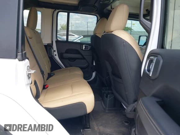 ✅ 2022 Jeep Wrangler Unlimited Sahara • VIN: 1C4HJXEN5NW144922 • Lot: 42452901. Listed on IAAI with 51,223 mi. Free auction sales archive from the USA and detailed vehicle history report at DreamBid. Image 8.