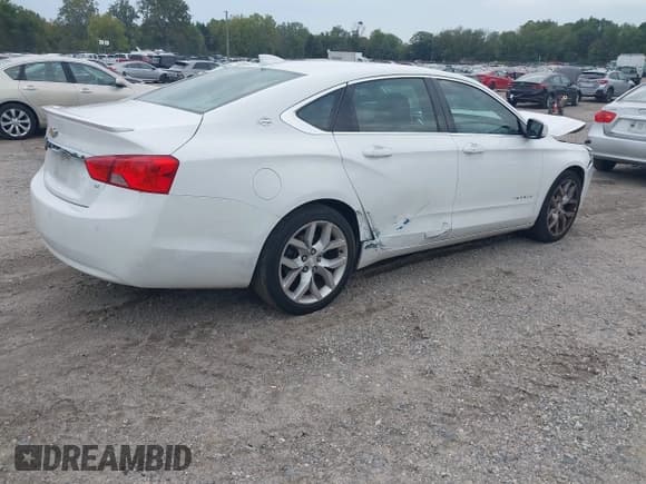 ✅ 2015 Chevrolet Impala LT • VIN: 2G1125S37F9137222 • Lot: 43332544. Listed on IAAI with 137,600 mi. Free auction sales archive from the USA and detailed vehicle history report at DreamBid. Image 4.
