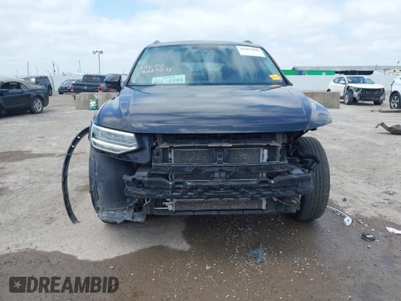 ✅ 2022 Volkswagen Tiguan S • VIN: 3VV0B7AX7NM137070 • Lot: 42492020. Wystawiony na IAAI z przebiegiem 24 396 mil. Bezpłatny archiwum sprzedaży aukcyjnych z USA i szczegółowy raport historii pojazdu na DreamBid. Zdjęcie 12.