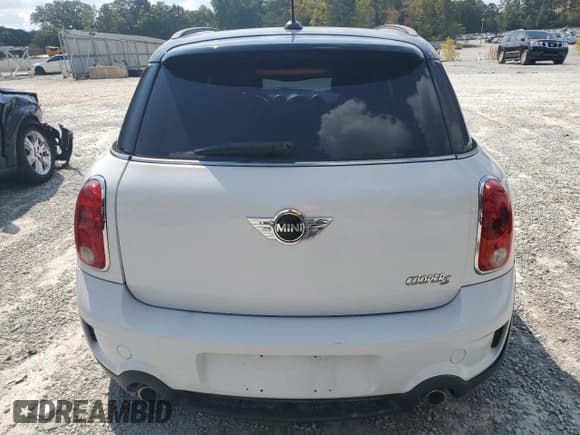 ✅ 2011 MINI Countryman S • VIN: WMWZC5C59BWL53627 • Лот: 81636815. Опубликован ранее на Copart с пробегом 99 033 миль. Бесплатный доступ к архиву аукционных продаж из США и подробный отчёт об истории автомобиля на DreamBid. Изображение 6.
