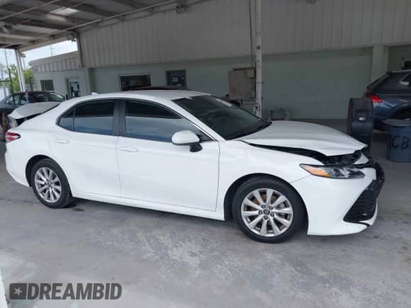 2019 Toyota Camry LE with VIN 4T1B11HK3KU709546, listed as a IAAI auction lot 42836396 with 113,611 mi miles and . Bid and sale history available at DreamBid. Image 13.