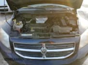 ✅ 2010 Dodge Caliber Mainstreet • VIN: 1B3CB3HAXAD648284 • Лот: 84856604. Опубликован ранее на Copart с пробегом 84 032 миль. Бесплатный доступ к архиву аукционных продаж из США и подробный отчёт об истории автомобиля на DreamBid. Изображение 11.