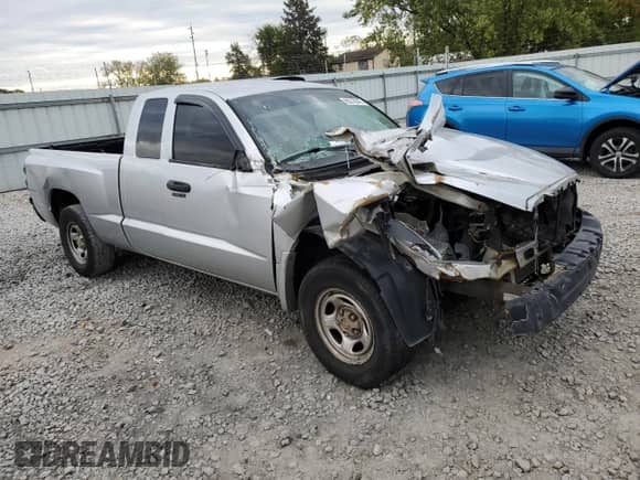 2007 Dodge Dakota ST z VIN 1D7HE22K97S107745, wystawiony jako Copart lot #86276645 z przebiegiem 237 231 mil mil oraz Szkoda całkowita • Salvage title. Historia ofert i sprzedaży dostępna na DreamBid. Obrazek 4.