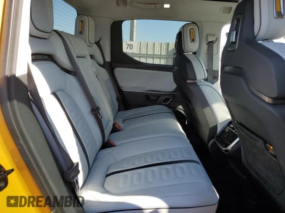 ✅ 2023 Rivian R1T Adventure • VIN: 7FCTGAAA8PN022857 • Lot: 63064315. Listed on Copart with 40,379 mi. Free auction sales archive from the USA and detailed vehicle history report at DreamBid. Image 10.