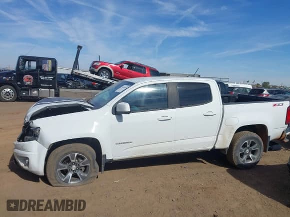 ✅ 2018 Chevrolet Colorado 2WD Z71 • VIN: 1GCGSDEN6J1173358 • Лот: 41620340. Опубликован ранее на IAAI с пробегом 93 185 миль. Бесплатный доступ к архиву аукционных продаж из США и подробный отчёт об истории автомобиля на DreamBid. Изображение 14.
