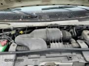 ✅ 2010 Ford Econoline Cargo Commercial • VIN: 1FTNE2EW6ADA01583 • Lot: 85033044. Listed on Copart with 98,464 mi. Free auction sales archive from the USA and detailed vehicle history report at DreamBid. Image 13.