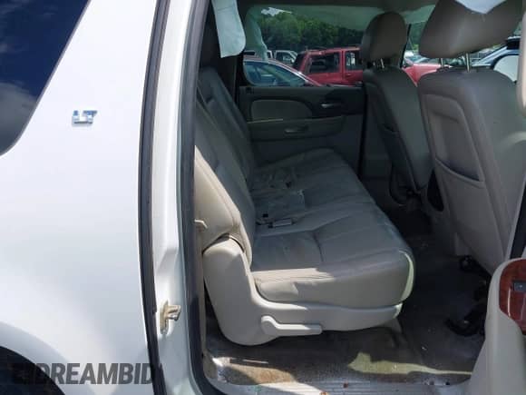 2014 Chevrolet Suburban LT z VIN 1GNSCJE07ER211222, wystawiony jako IAAI lot #42428084 z przebiegiem 214 712 mil mil oraz . Historia ofert i sprzedaży dostępna na DreamBid. Obrazek 8.