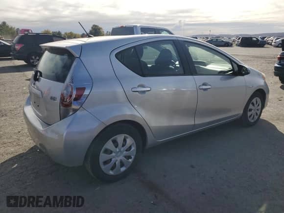 2012 Toyota Prius Two with VIN JTDKDTB3XC1527564, listed as a Copart auction lot 89484385 with 128,250 mi miles and Salvage title. Bid and sale history available at DreamBid. Image 3.