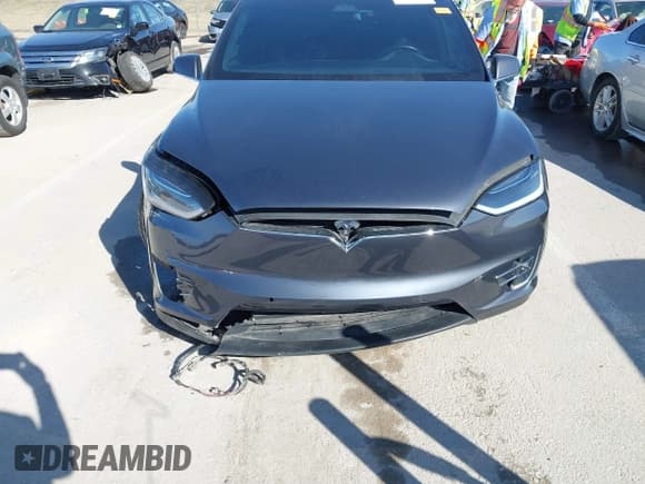 ✅ 2016 Tesla Model X P90D • VIN: 5YJXCAE46GF028288 • Lot: 41732530. Listed on IAAI with 102,020 mi. Free auction sales archive from the USA and detailed vehicle history report at DreamBid. Image 12.