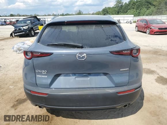 ✅ 2022 Mazda CX-30 S Carbon Edition • VIN: 3MVDMBCL8NM414346 • Лот: 71610055. Опубликован ранее на Copart с пробегом Не указан. Бесплатный доступ к архиву аукционных продаж из США и подробный отчёт об истории автомобиля на DreamBid. Изображение 6.