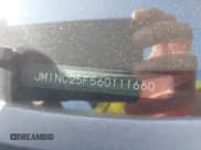 ✅ 2006 Mazda MX-5 Miata Sport • VIN: JM1NC25F560111660 • Lot: 42827191. Listed on IAAI with 71,282 mi. Free auction sales archive from the USA and detailed vehicle history report at DreamBid. Image 9.