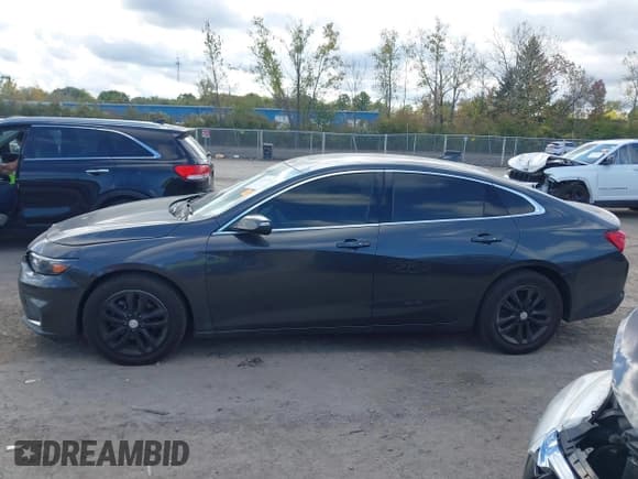 ✅ 2017 Chevrolet Malibu LT • VIN: 1G1ZE5STXHF105434 • Lot: 43367483. Listed on IAAI with 203,845 mi. Free auction sales archive from the USA and detailed vehicle history report at DreamBid. Image 14.
