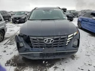 ✅ 2022 Hyundai Tucson Blue • VIN: KM8JBCA14NU049270 • Lot: 36738543. Wystawiony na Copart z przebiegiem 14 639 mil. Bezpłatny archiwum sprzedaży aukcyjnych z USA i szczegółowy raport historii pojazdu na DreamBid. Zdjęcie 5.