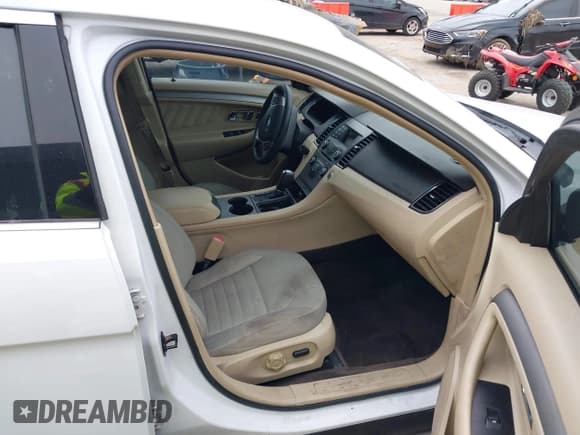 ✅ 2014 Ford Taurus SE • VIN: 1FAHP2D81EG164467 • Лот: 43777381. Опубликован ранее на IAAI с пробегом 123 200 миль. Бесплатный доступ к архиву аукционных продаж из США и подробный отчёт об истории автомобиля на DreamBid. Изображение 5.