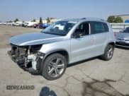 ✅ 2017 Volkswagen Tiguan Sport • VIN: WVGTV7AX7HK030966 • Lot: 85204945. Listed on Copart with 111,844 mi. Free auction sales archive from the USA and detailed vehicle history report at DreamBid. Image 1.