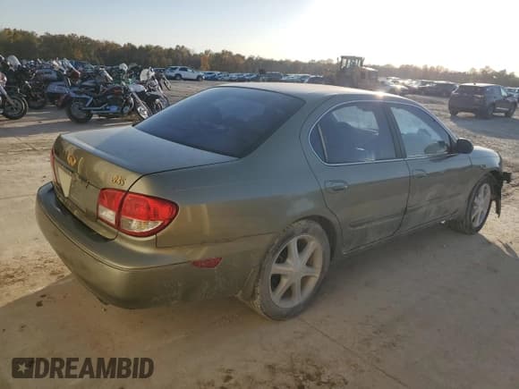 ✅ 2002 Infiniti I35 Luxury • VIN: JNKDA31A62T014458 • Лот: 77677764. Опубликован ранее на Copart с пробегом 169 007 миль. Бесплатный доступ к архиву аукционных продаж из США и подробный отчёт об истории автомобиля на DreamBid. Изображение 3.