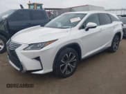 ✅ 2018 Lexus RX 350L Premium • VIN: JTJGZKCAXJ2003303 • Лот: 42159144. Опубликован ранее на IAAI с пробегом 105 147 миль. Бесплатный доступ к архиву аукционных продаж из США и подробный отчёт об истории автомобиля на DreamBid. Изображение 2.