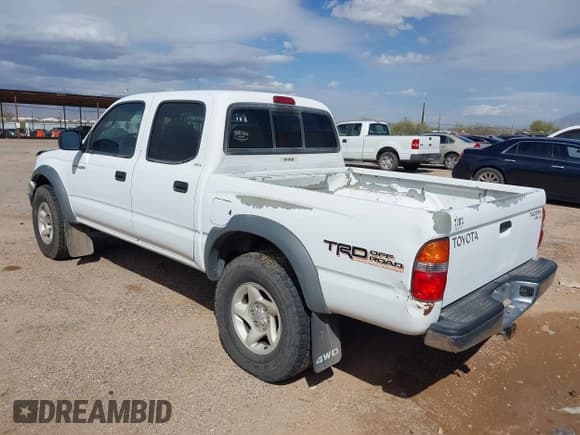 ✅ 2002 Toyota Tacoma • VIN: 5TEHN72N52Z014890 • Lot: 37759406. Listed on IAAI with 228,925 mi. Free auction sales archive from the USA and detailed vehicle history report at DreamBid. Image 3.
