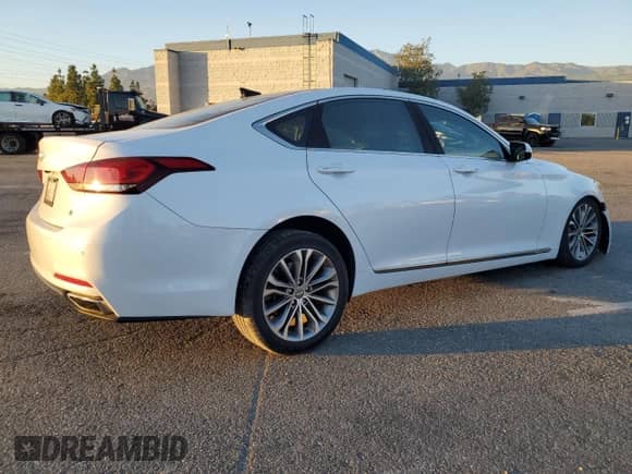2015 Hyundai Genesis 3.8L z VIN KMHGN4JE2FU025819, wystawiony jako Copart lot #81950194 z przebiegiem 42 259 mil mil oraz Szkoda całkowita • Salvage title. Historia ofert i sprzedaży dostępna na DreamBid. Obrazek 3.