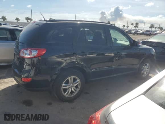 2012 Hyundai Santa Fe GLS с VIN 5XYZG3AB1CG126290, выставлен на аукционе Copart как лот 75196484 с пробегом Не указан миль и Списание • Salvage title. История ставок и продаж доступна на DreamBid. Изображение 3.