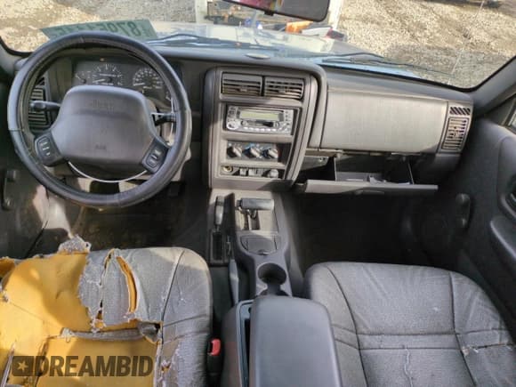✅ 1999 Jeep Cherokee SE • VIN: 1J4FF28S5XL646812 • Lot: 87951115. Listed on Copart with 230,161 mi. Free auction sales archive from the USA and detailed vehicle history report at DreamBid. Image 8.