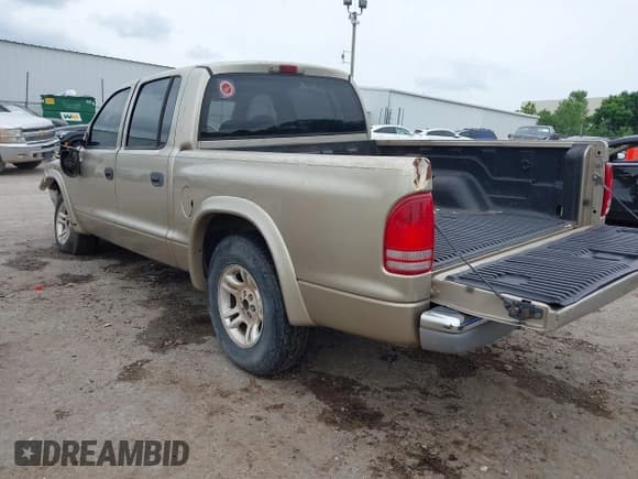✅ 2004 Dodge Dakota SLT • VIN: 1D7HL48N84S619527 • Lot: 42484398. Listed on IAAI with 275,998 mi. Free auction sales archive from the USA and detailed vehicle history report at DreamBid. Image 3.