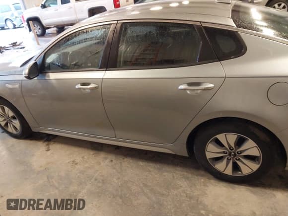 ✅ 2017 Kia Optima • VIN: KNAGT4LEXH5013371 • Lot: 43760725. Listed on IAAI with 155,323 mi. Free auction sales archive from the USA and detailed vehicle history report at DreamBid. Image 14.