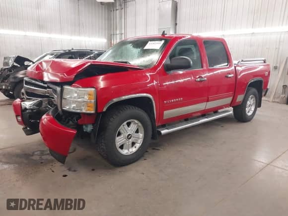 2011 Chevrolet Silverado 1500 LT z VIN 3GCPKSE39BG381465, wystawiony jako IAAI lot #43282395 z przebiegiem 149 655 mil mil oraz . Historia ofert i sprzedaży dostępna na DreamBid. Obrazek 2.