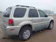 2005 Mercury Mariner Luxury z VIN 4M2YU56175DJ10333, wystawiony jako IAAI lot #41644749 z przebiegiem 174 477 mil mil oraz . Historia ofert i sprzedaży dostępna na DreamBid. Obrazek 4.