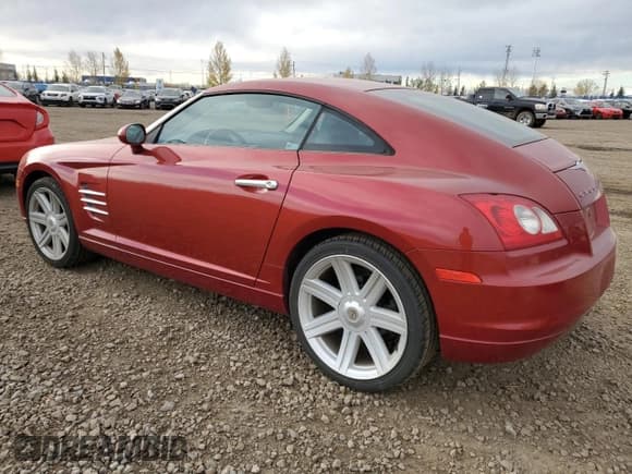 ✅ 2005 Chrysler Crossfire Limited • VIN: 1C3AN69LX5X040918 • Lot: 76504944. Listed on Copart with 42,368 mi. Free auction sales archive from the USA and detailed vehicle history report at DreamBid. Image 2.