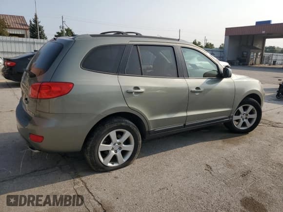 ✅ 2007 Hyundai Santa Fe SE • VIN: 5NMSH13E67H077335 • Lot: 70749084. Listed on Copart with 180,063 mi. Free auction sales archive from the USA and detailed vehicle history report at DreamBid. Image 3.