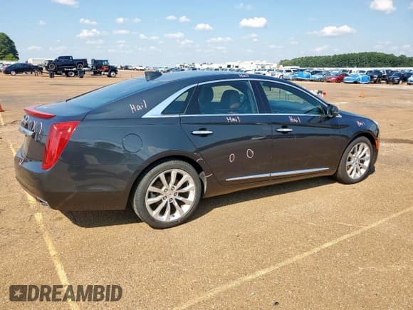 ✅ 2015 Cadillac XTS Luxury • VIN: 2G61M5S30F9200424 • Lot: 71106975. Listed on Copart with 122,427 mi. Free auction sales archive from the USA and detailed vehicle history report at DreamBid. Image 3.