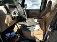 ✅ 2002 Jeep Wrangler Sahara • VIN: 1J4FA59S12P761276 • Lot: 90629975. Listed on Copart with 160,977 mi. Free auction sales archive from the USA and detailed vehicle history report at DreamBid. Image 7.