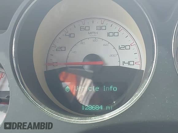 2014 Dodge Challenger SXT 100th Anniversary with VIN 2C3CDYAG0EH285477, listed as a IAAI auction lot 42298675 with 128,684 mi miles and . Bid and sale history available at DreamBid. Image 15.