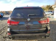 ✅ 2018 BMW X5 xDrive35i • VIN: 5UXKR0C57J0Y05886 • Лот: 91528005. Опубликован ранее на Copart с пробегом 90 449 миль. Бесплатный доступ к архиву аукционных продаж из США и подробный отчёт об истории автомобиля на DreamBid. Изображение 6.