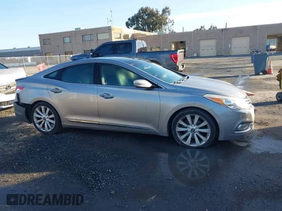 ✅ 2013 Hyundai Azera • VIN: KMHFH4JG3DA230844 • Lot: 41817997. Wystawiony na IAAI z przebiegiem 129 163 mil mil. Skorzystaj z bezpłatnego archiwum sprzedaży aukcyjnych z USA i zobacz szczegółowy raport historii pojazdu na DreamBid. Zdjęcie 14.