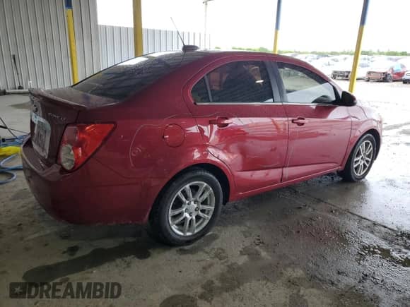 2016 Chevrolet Sonic LT с VIN 1G1JC5SH9G4169649, выставлен на аукционе Copart как лот 64244434 с пробегом 162 355 миль миль и Списание • Salvage title. История ставок и продаж доступна на DreamBid. Изображение 3.