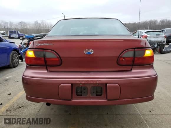 2003 Chevrolet Malibu with VIN 1G1ND52J13M696712, listed as a Copart auction lot 86052984 with 81,635 mi miles and Salvage title. Bid and sale history available at DreamBid. Image 6.