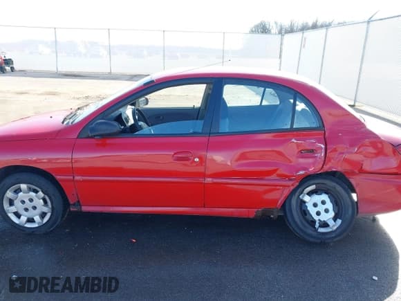 ✅ 2002 Kia Rio • VIN: KNADC123526160314 • Lot: 41527989. Wystawiony na IAAI z przebiegiem 124 252 mil. Bezpłatny archiwum sprzedaży aukcyjnych z USA i szczegółowy raport historii pojazdu na DreamBid. Zdjęcie 15.