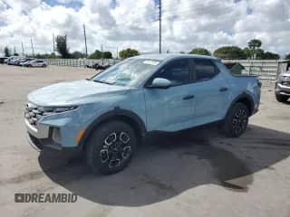 2024 Hyundai Santa Cruz SE with VIN 5NTJA4AE3RH083184, listed as a Copart auction lot 90419595 with 21,588 mi miles and Salvage title. Bid and sale history available at DreamBid. Image 1.