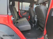 ✅ 2015 Jeep Wrangler Unlimited Sport • VIN: 1C4BJWDG3FL673436 • Lot: 90598515. Listed on Copart with 98,028 mi. Free auction sales archive from the USA and detailed vehicle history report at DreamBid. Image 11.