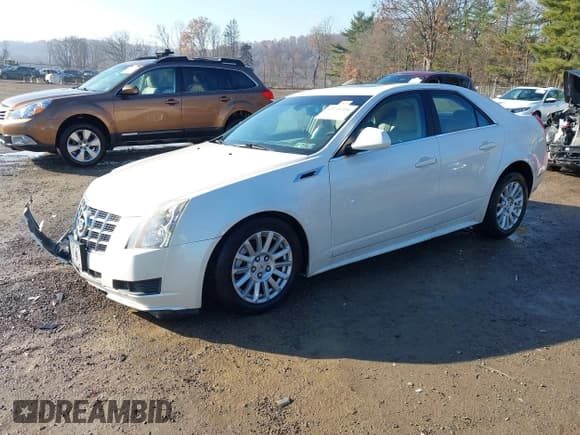 ✅ 2013 Cadillac CTS Luxury • VIN: 1G6DG5E51D0157141 • Лот: 43721351. Опубликован ранее на IAAI с пробегом 119 383 миль. Бесплатный доступ к архиву аукционных продаж из США и подробный отчёт об истории автомобиля на DreamBid. Изображение 2.