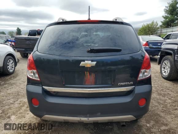 2012 Chevrolet Captiva Sport LS z VIN 3GNAL2EK4CS552414, wystawiony jako Copart lot #70188984 z przebiegiem 84 697 mil mil oraz Czysty tytuł • Clean title. Historia ofert i sprzedaży dostępna na DreamBid. Obrazek 6.