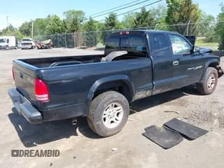 ✅ 2001 Dodge Dakota Sport • VIN: 1B7GG22N31S223265 • Lot: 42297809. Wystawiony na IAAI z przebiegiem 144 059 mil. Bezpłatny archiwum sprzedaży aukcyjnych z USA i szczegółowy raport historii pojazdu na DreamBid. Zdjęcie 4.
